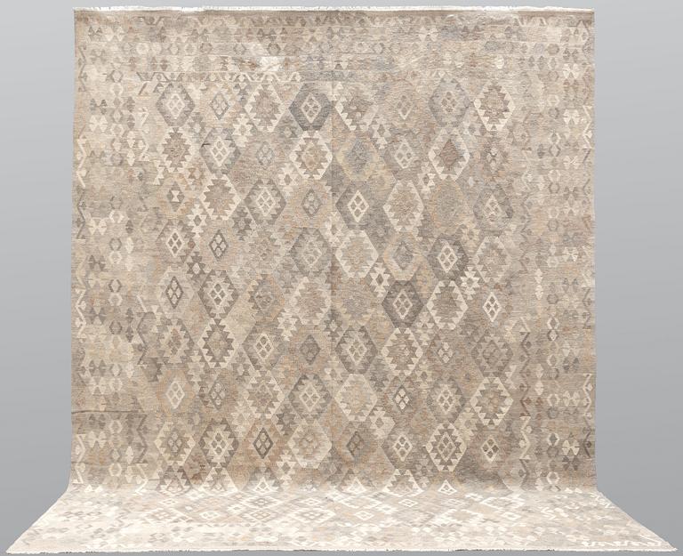 A Kilim carpet, ca 391 x 311 cm.