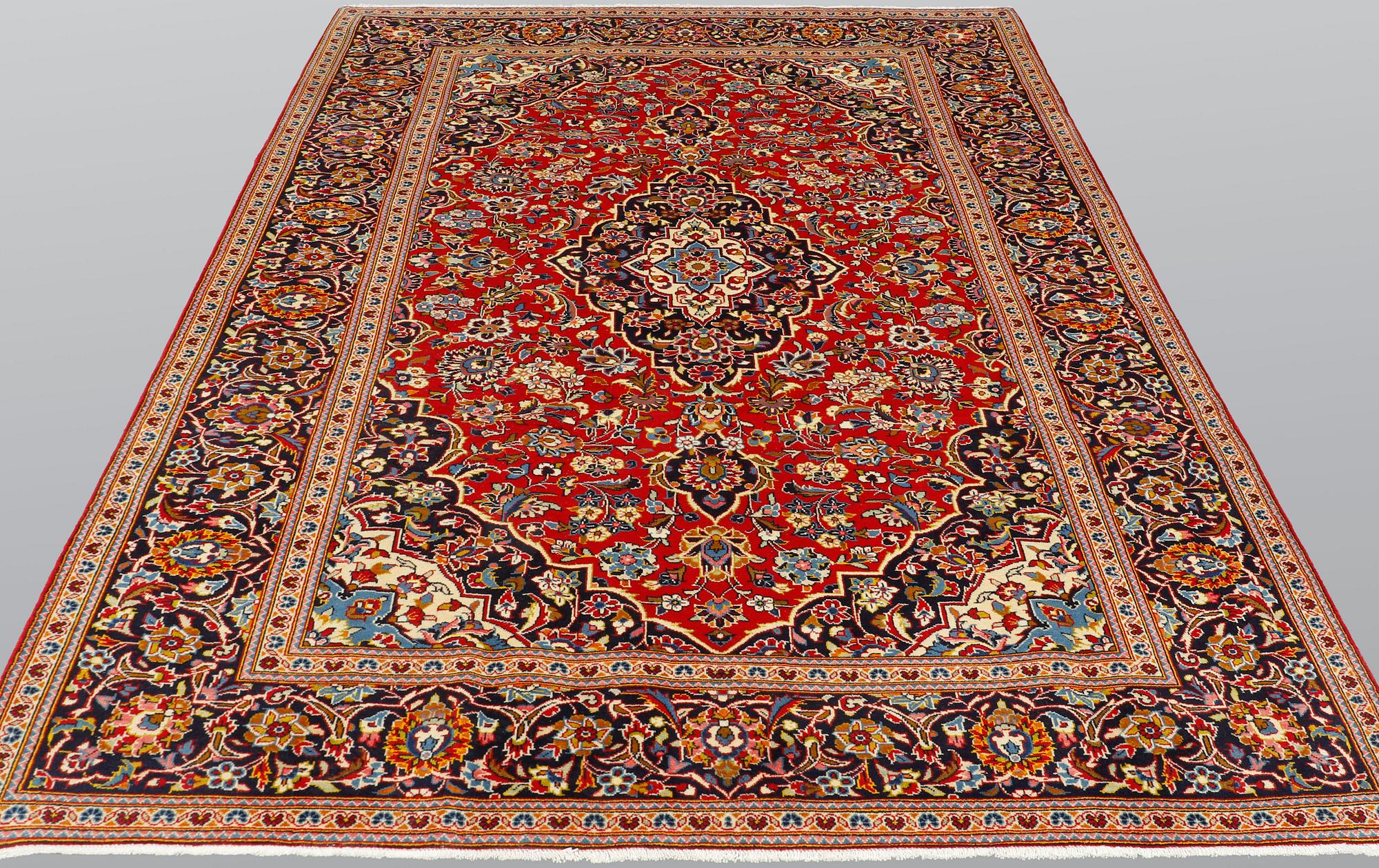 A Keshan carpet, c. 314 x 197 cm.