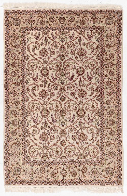 An Isfahan part silk rug, c. 161 x 110 cm.