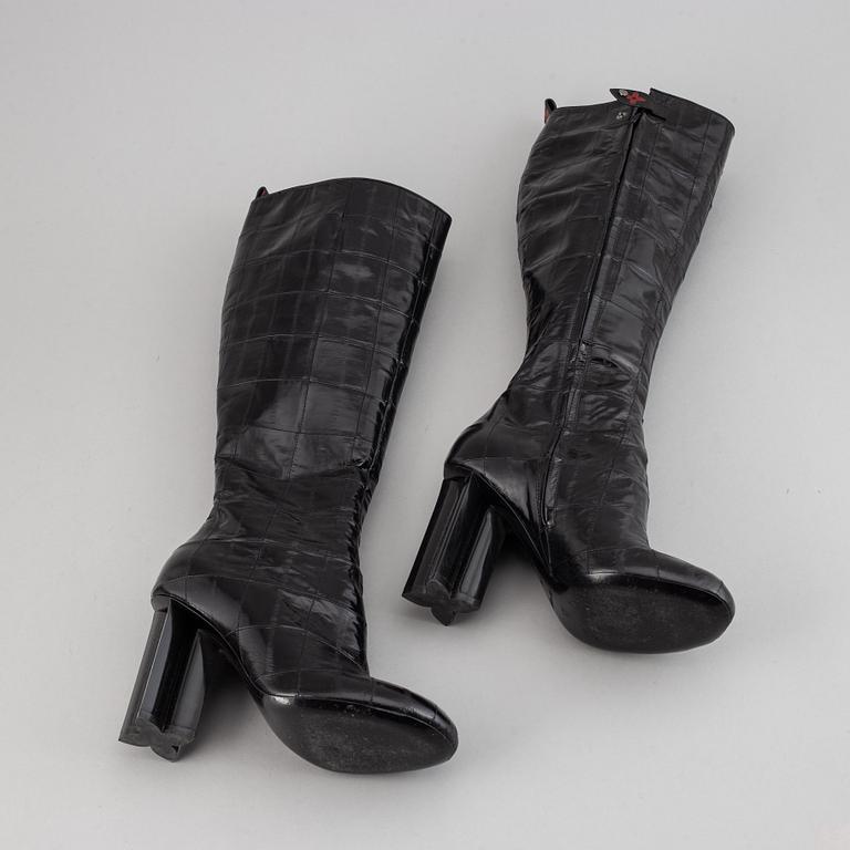 LOUIS VUITTON, a pair of letaher boots, size 37.