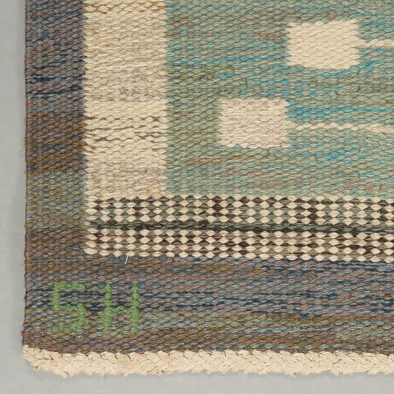 Edna Martin, A CARPET. "Flickorna i fönstret". Flat weave. 254 x 200 cm. Signed SH.