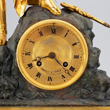 A french Empire pendulum clock, first half of the 19th century.
