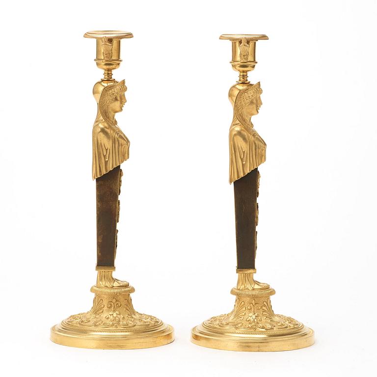 A pair of Empire circa 1810 candlesticks.