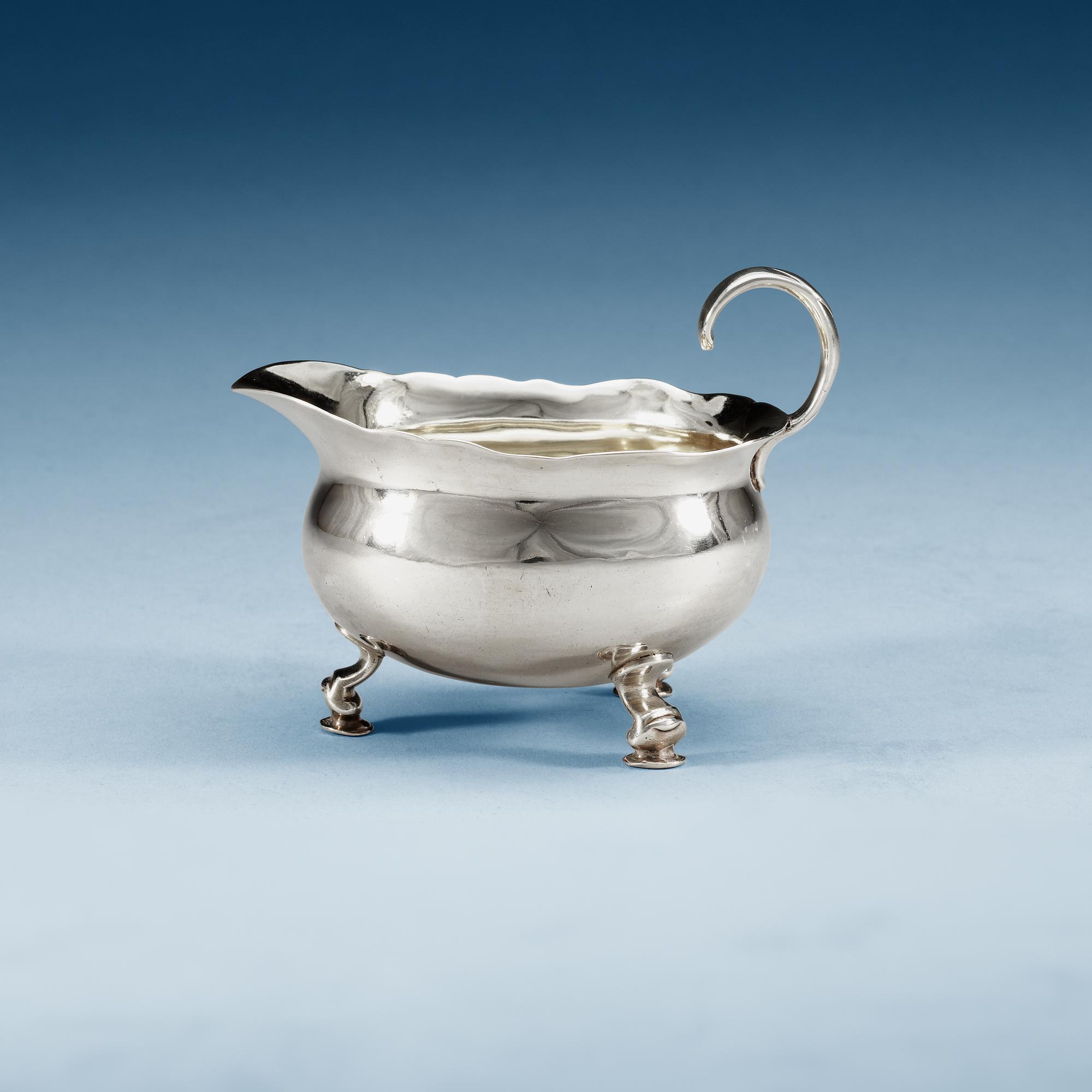 A Swedish 18th century parcel-gilt cream-jug, makers mark of Henrik Wittkopf d.ä., Stockholm 1747.