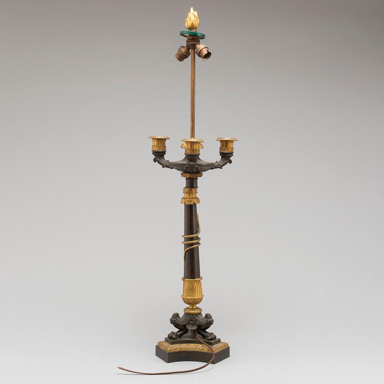 A first half of the 19th century bronze table lamp.