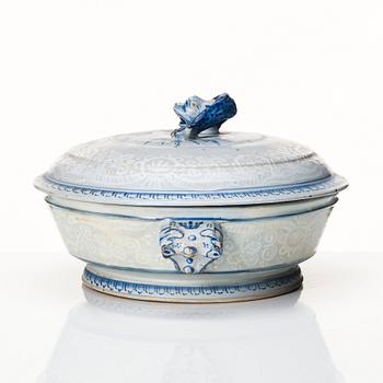 A round Swedish Rörstrand faience tureen with cover, dated 24/4 1752.