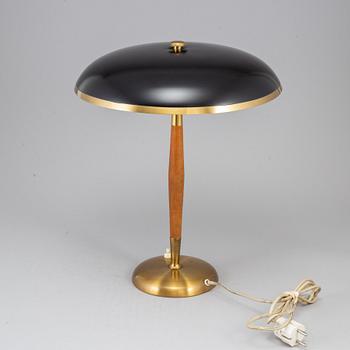 A Boréns brass and teak table lamp. Borås, Sweden mid 20th century.