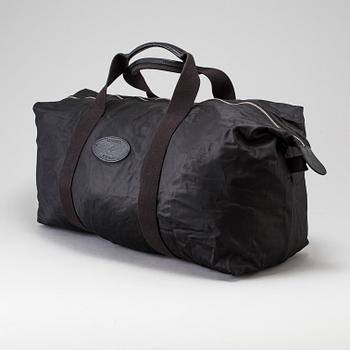 A foldable Mulberry weekend bag.