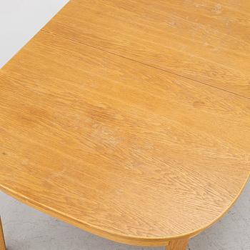 Carl Malmsten, Dining table with 6 chairs, “Ambassadör”, second half of the 20th century.