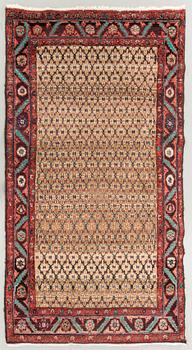 AN old Koliai carpet ca 240 x 131 cm.