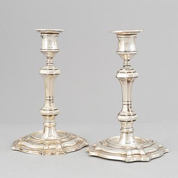 A pair of silver candlesticks, mark of William Hutton & Sons Ltd, London 1900.