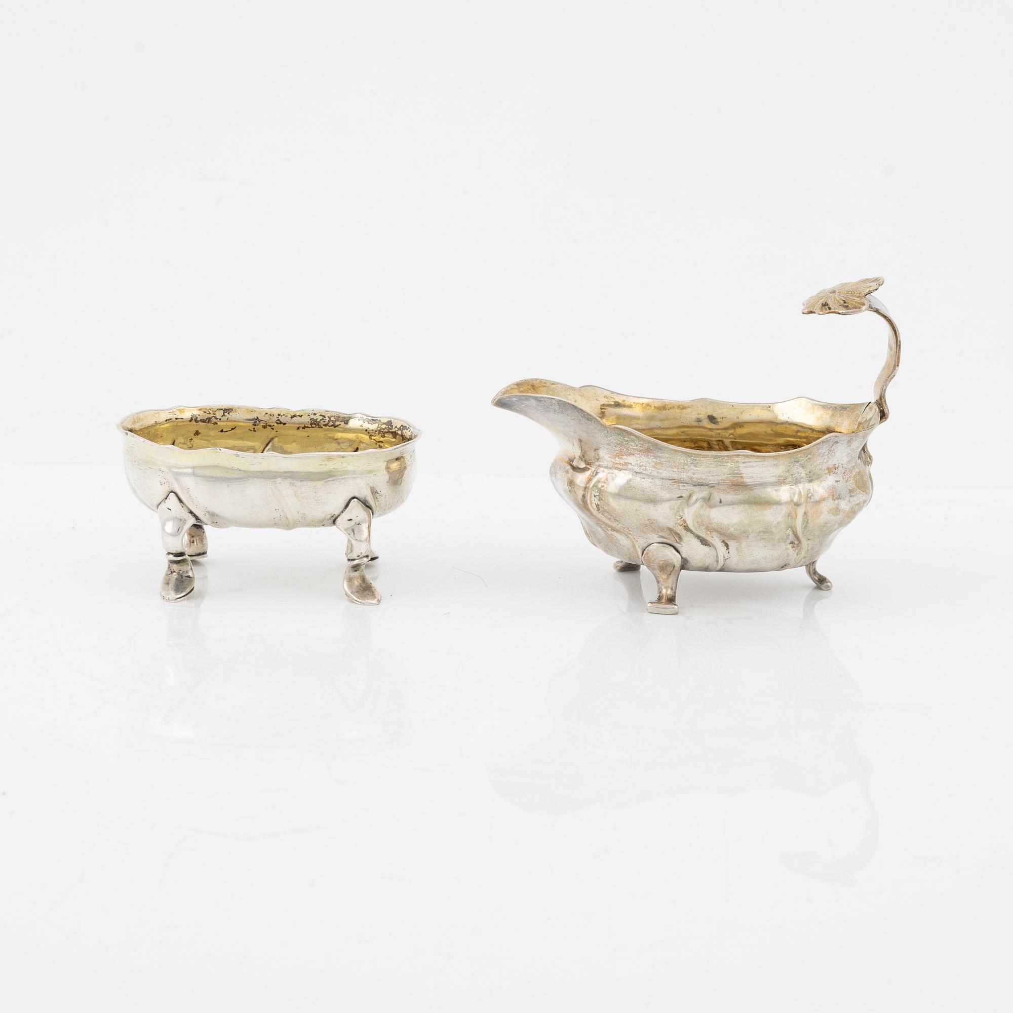 A Swedish Parcel-Gilt Silver Rococo Creamer and Salt Cellar, 18th century.
