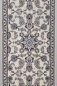 A runner carpet, Nain, part silk, ca 289 x 79 cm.