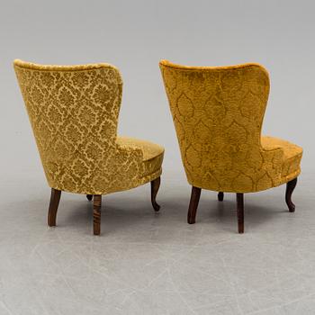 a pair of early 20th century chairs.