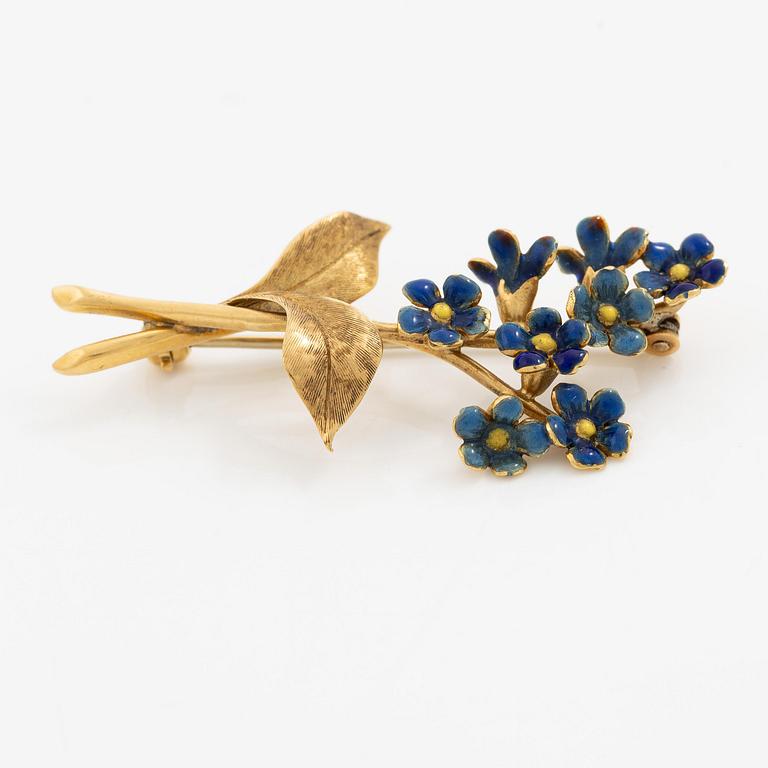 Brosch i form av en blombukett 18K guld med blå emalj.