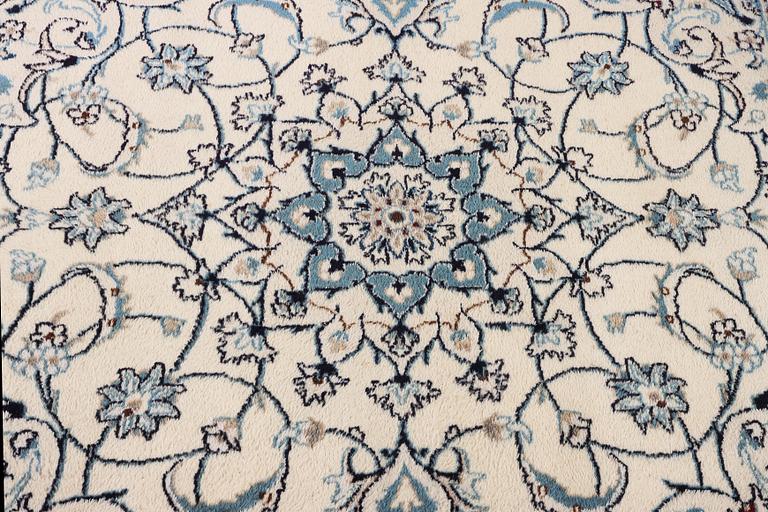A Nain crug, part silk, c. 200 x 193 cm.