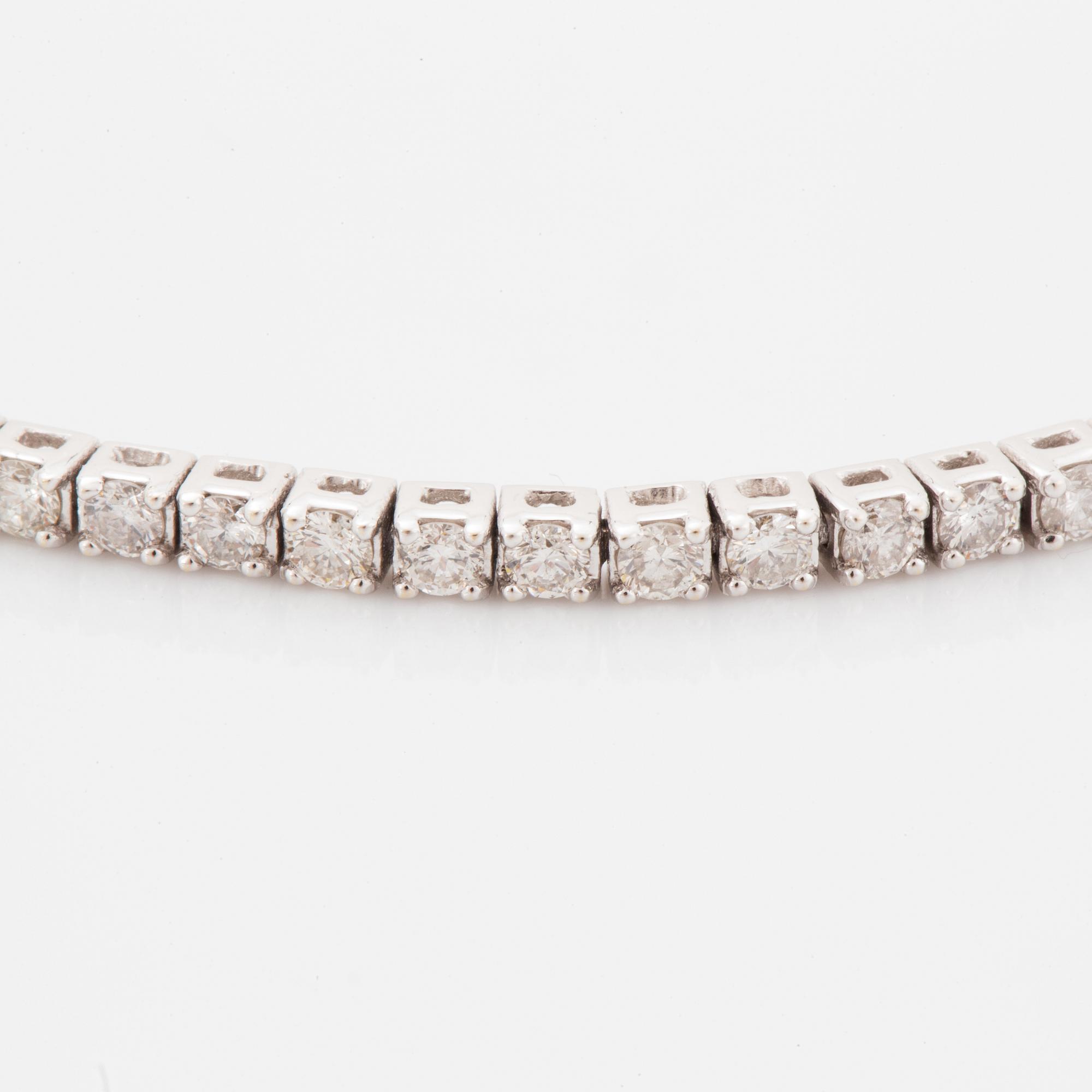 Brilliant-cut diamond tennis bracelet, with report W.G.I.