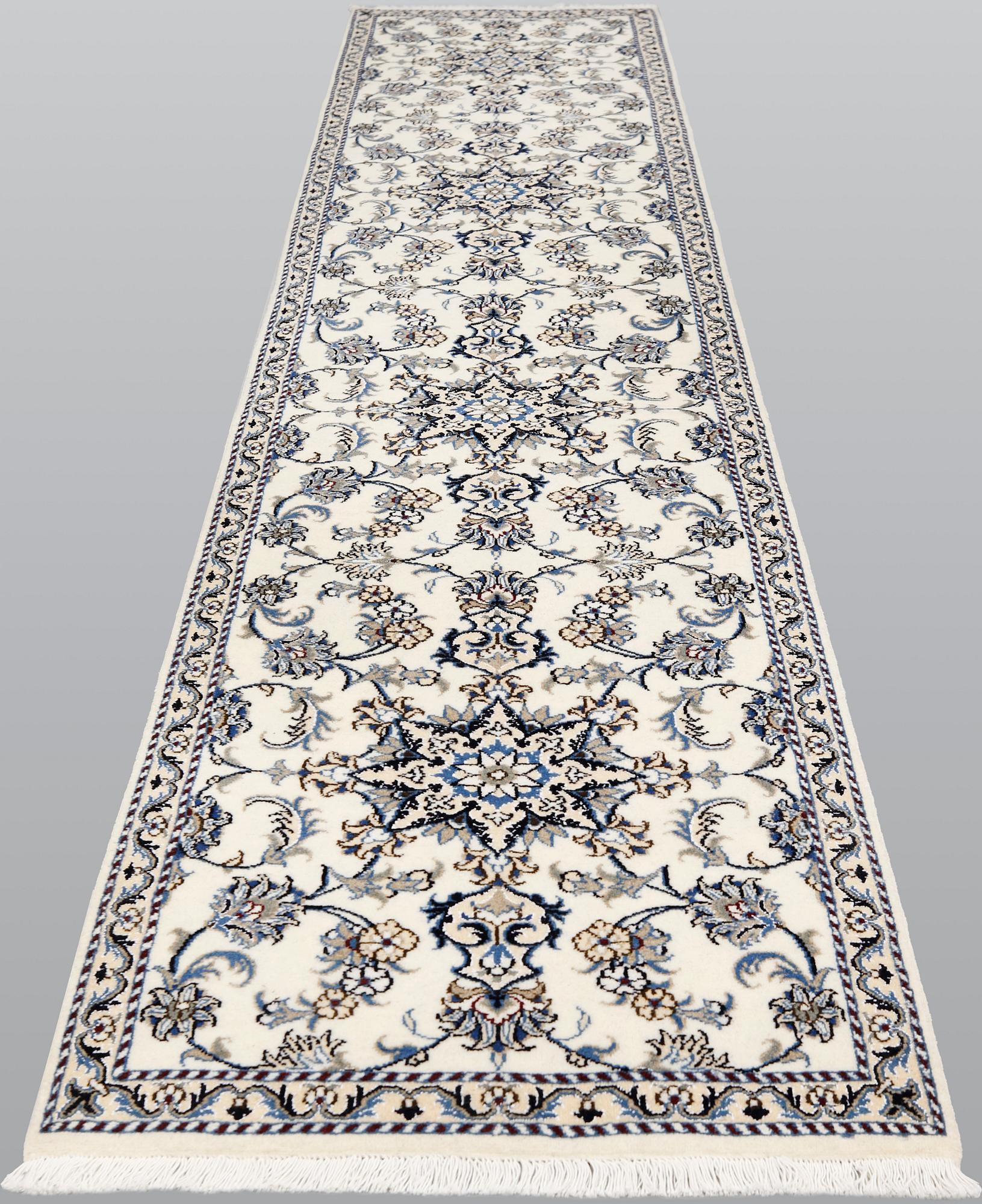 A Nain runner, ca 386 x 82 cm.