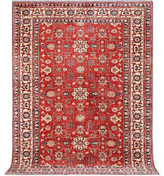 A Kazak carpet, c. 325 x 240 cm.