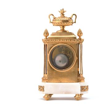 A Louis XVI circa 1780 mantel clock.