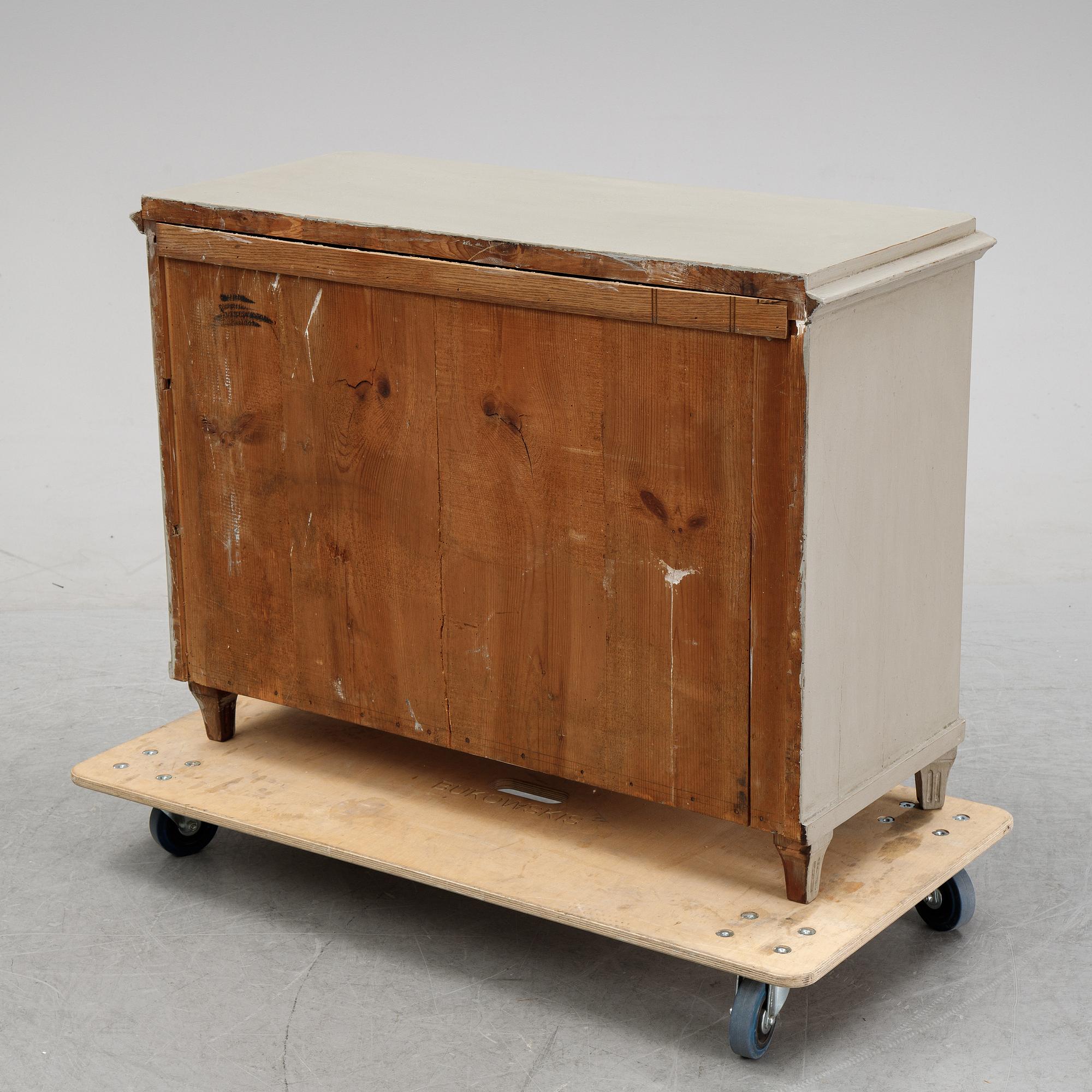 A painted 19th Century chest of drawers.