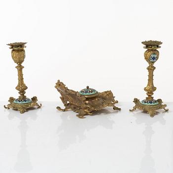 A pair candlesticks and an inkwell, circa 1900.