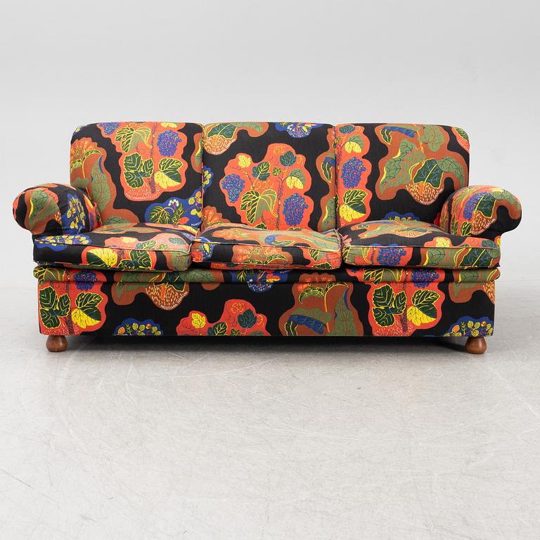 A model 703 sofa by Josef Frank for Firma Svenskt Tenn.