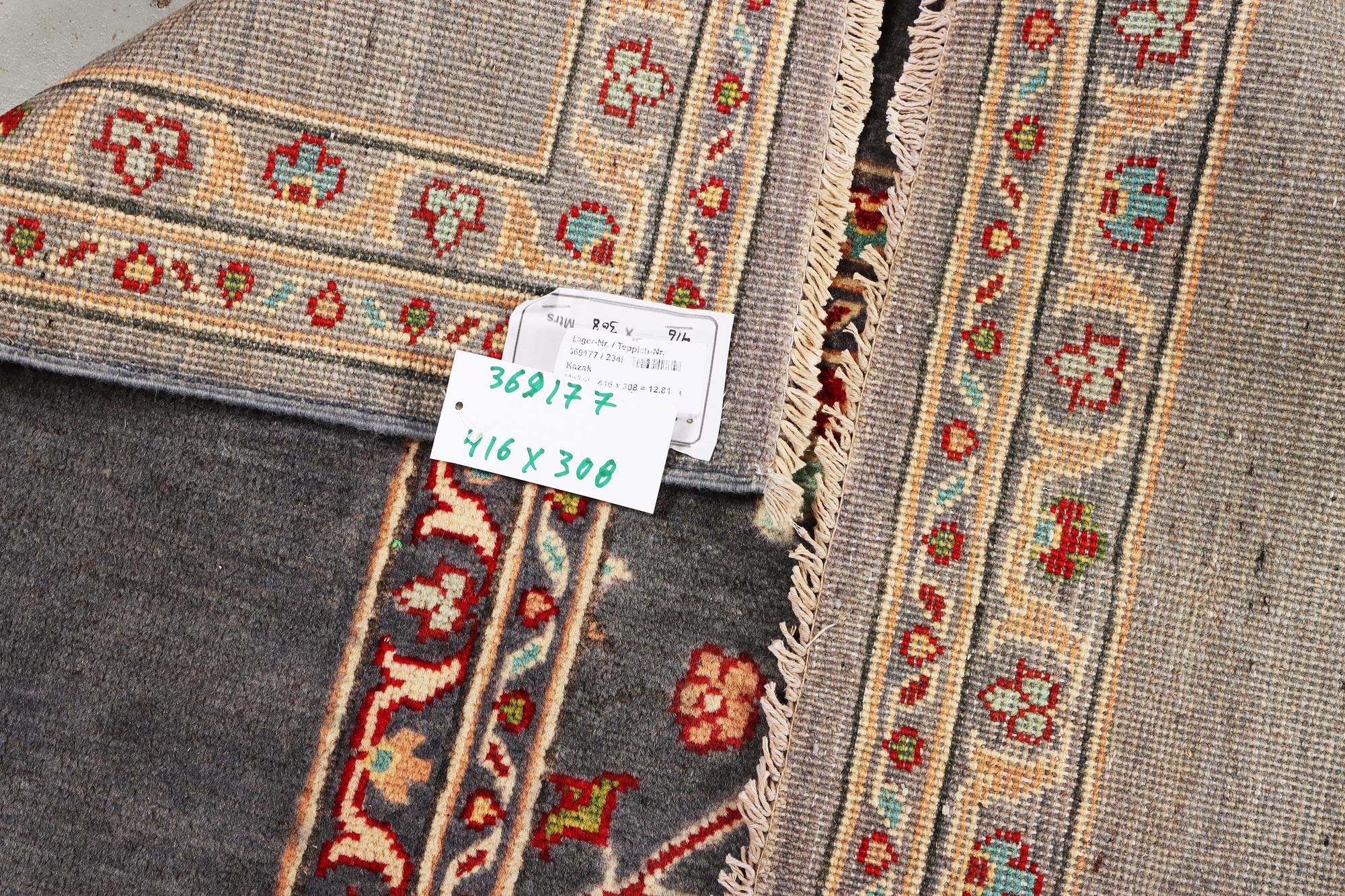 A Kazak carpet, c. 416 x 308 cm.
