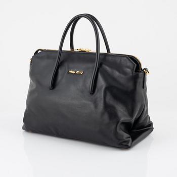 Miu Miu, a black leather handbag.