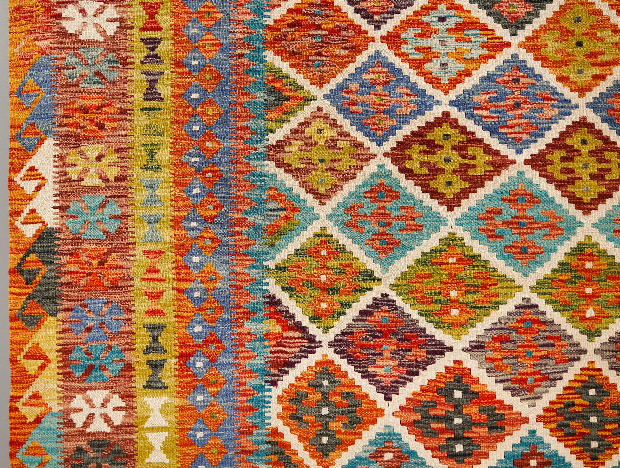A kilim carpet, approximately 353 x 246 cm.