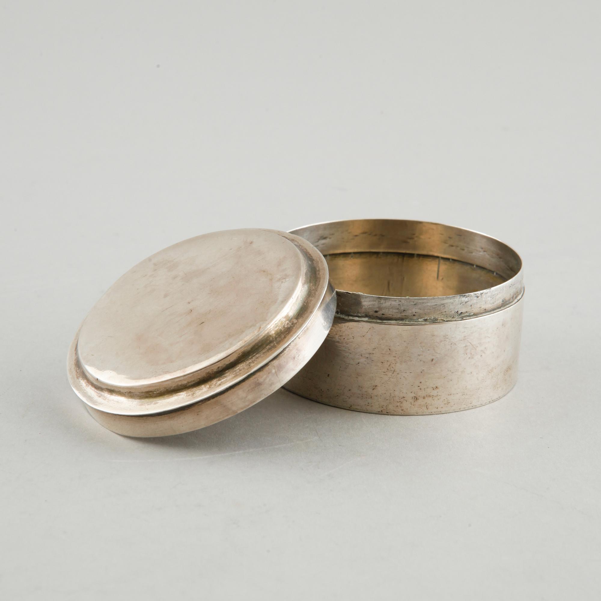 A silver box, a beaker and a basket, partly Sweden, 19th century.