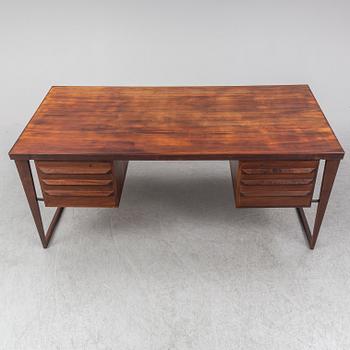 A 1960's rosewood desk by Kai Kristiansen, Feldballes Møbelfabrik, Denmark.