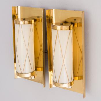 A pair of mid 20th century wall lights for Aris, Arisuo, Finland.