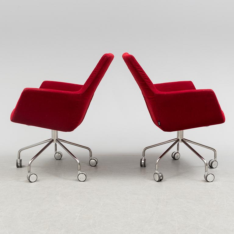 A pair of "Happy" armchairs by Roger Persson, Swedese.