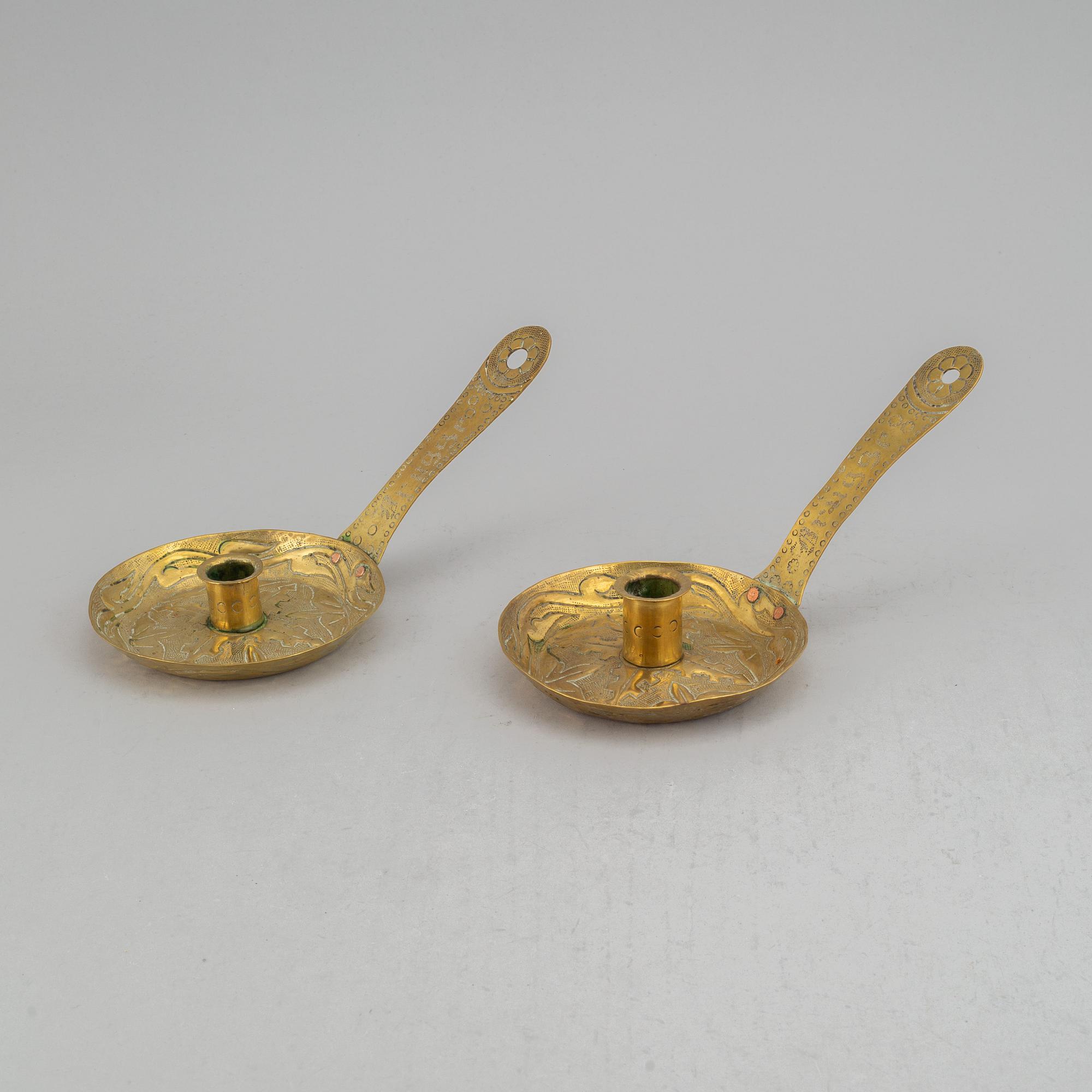 A pair of 19th century brass night light holders.