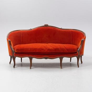 A Louis XV sofa, France, mid 18th Century.