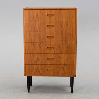 A mid 20th century teak chest of drawers.