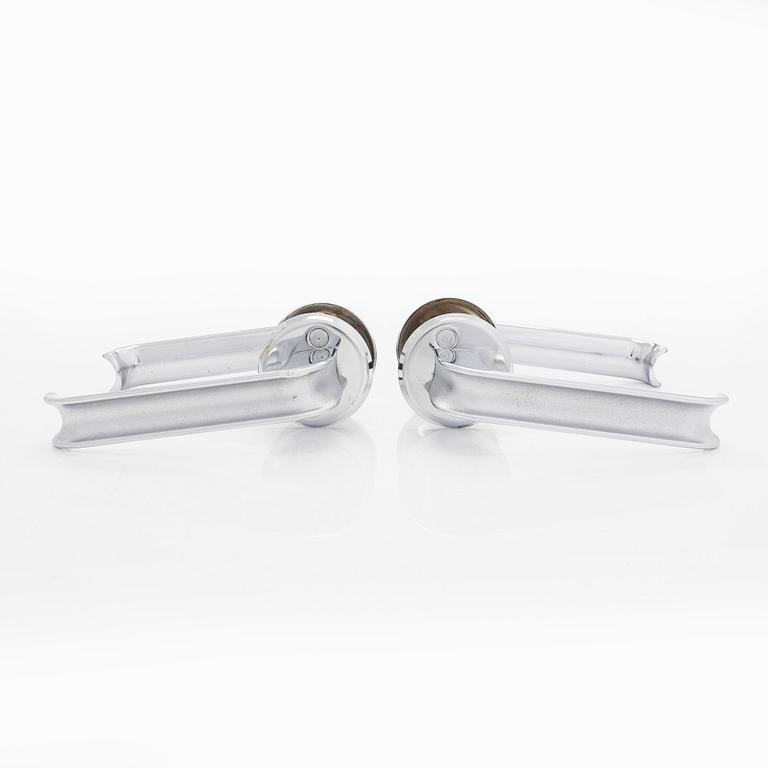 A set of six 1960s-1970s door handles.