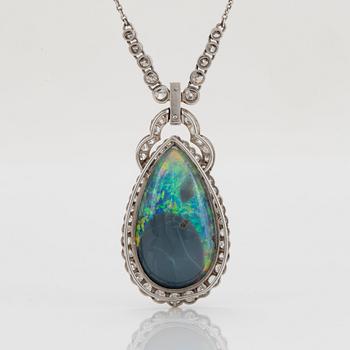 A platinum and black opal necklace set with old- and eight-cut diamonds.