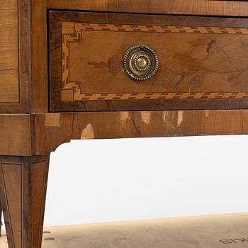 A Louis XVI-style marquetry and marble commode, later part of the 19th century.
