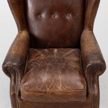 An armchair, contemporary.