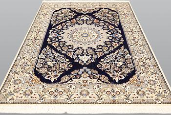 A part silk Nain carpet, approx. 165 x 123 cm.