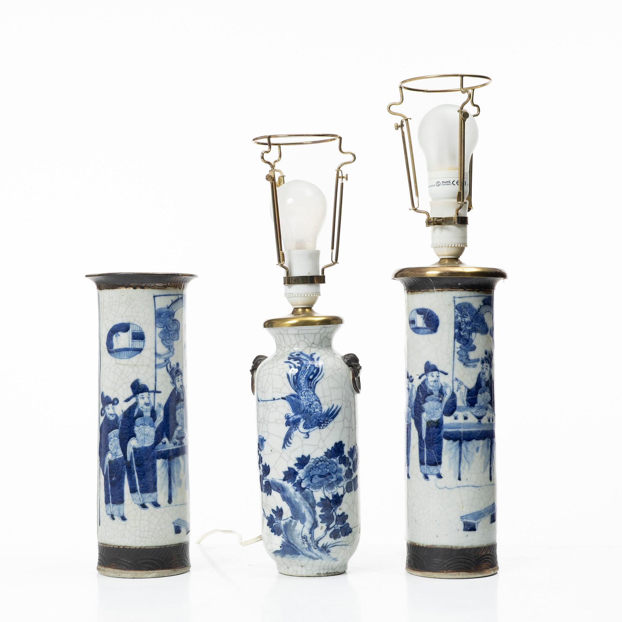 A group of three Chinese porcelain vases, two of them converted into table lamps, around 1900.
