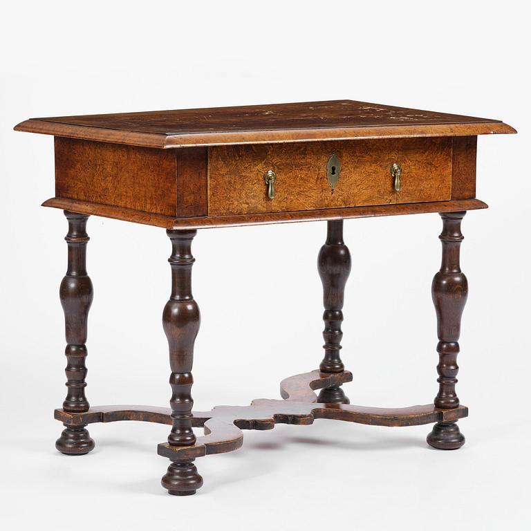 A Swedish late baroque burr-alder table, Stockholm, first part 18th century.