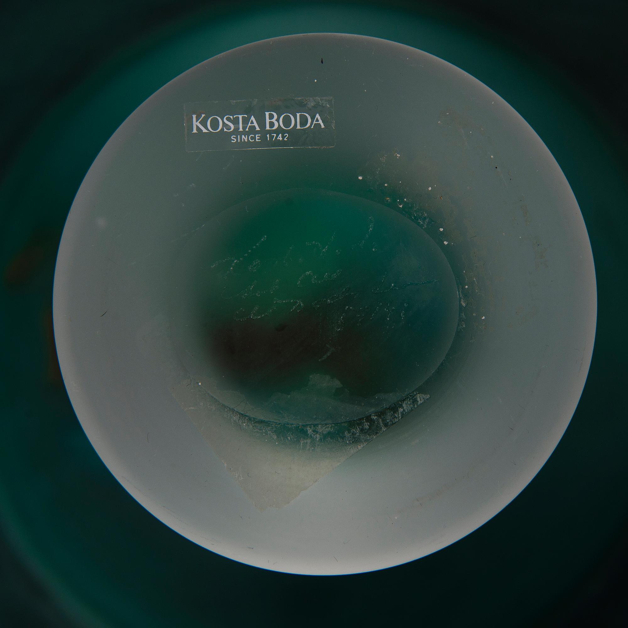 A glass bowl and decanter, signed, Kosta Boda, second half of 20th Century.