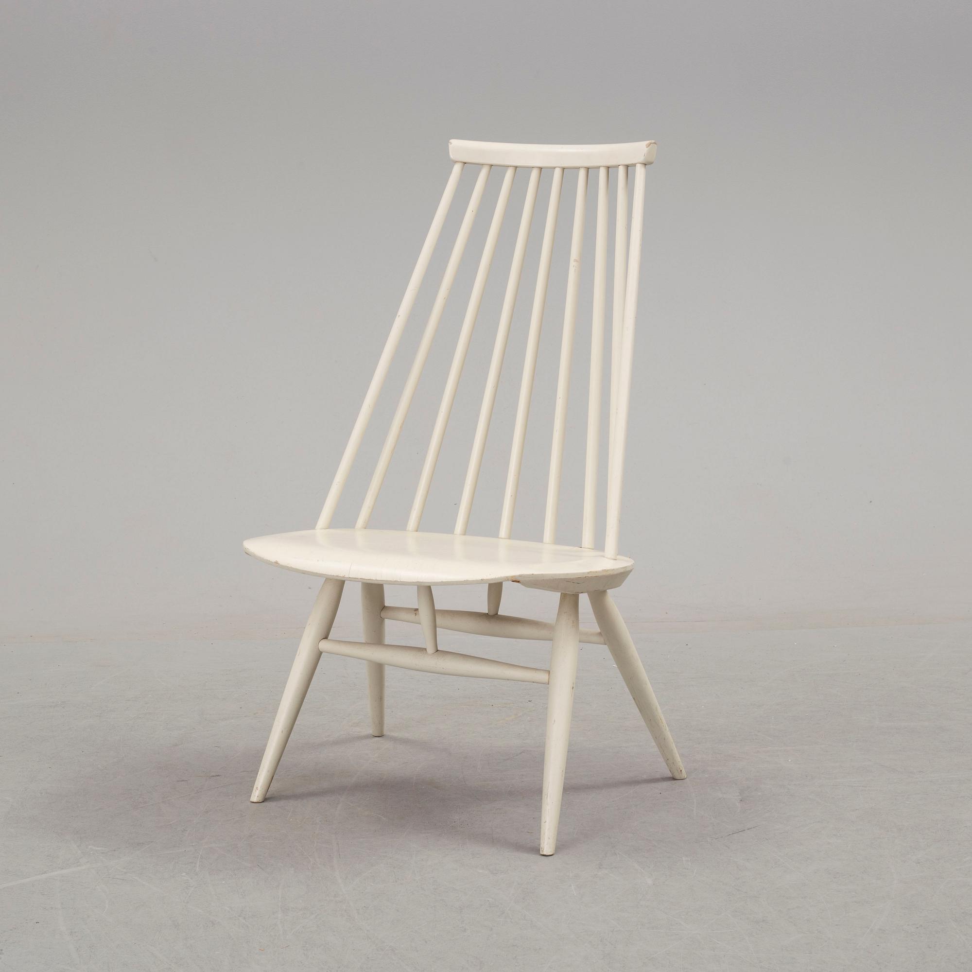 A second half of the 20th century 'mademoiselle' chair by Ilmari Tapiovaara.
