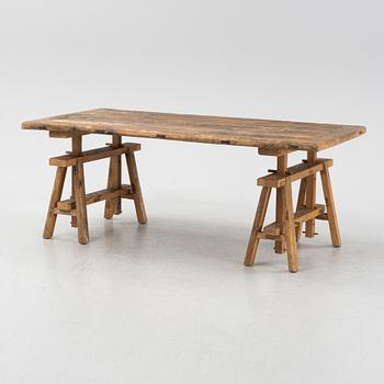 A Walles & Walles dining table.
