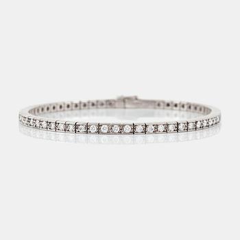 A brilliant-cut diamond, circa 1.70 cts, bracelet. Signed Cartier.