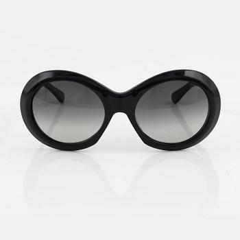 Oliver Goldsmith, a pair of black "Audrey" sunglasses.