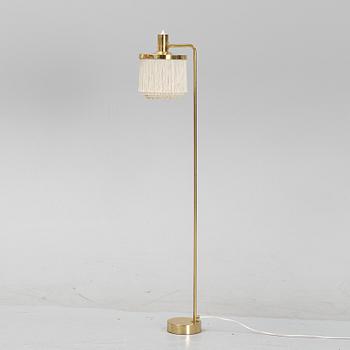 Hans-Agne Jakobsson, a 'G-109' brass floor lamp from Markaryd.